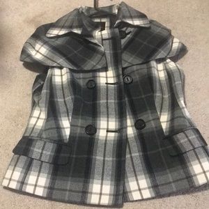 Limited plains vest with removable cape.